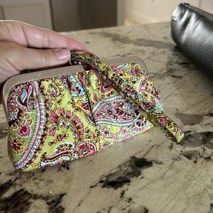 Vera Bradley clutch /wristlet with removable wrist strap.